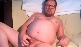 I am naked on my couch, watch me jerk off.