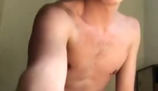 Danny wanks his uncut cock