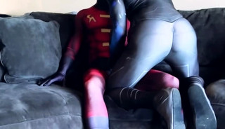 two twinks in superhero costumes