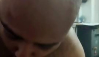 bald indian slave serving master