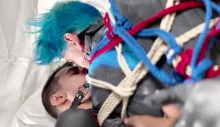 Nightwing and Robin in bondage and liplocker ball gag