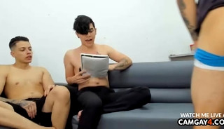 Three boys caress each other