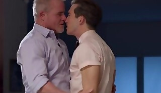 Dale Savage and his student Isaac Parker come together for a sensual kiss