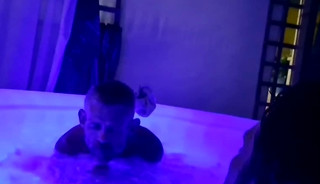 Naked fun in hot tub.