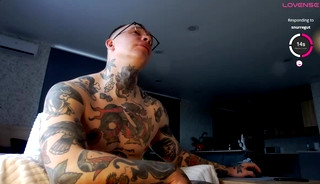 Tattooed Hunk Tom Shoots a Big Cumload With Sex Toy