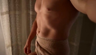Muscular guy wanking after the shower