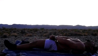Muscle bottom fucked in desert