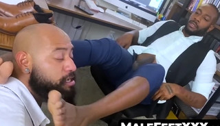 Bearded Black Stud Licks Boss's Feet While Strokes His Big Cock