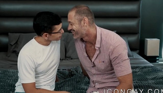 Young Latino twink rides a huge mature gay and moans