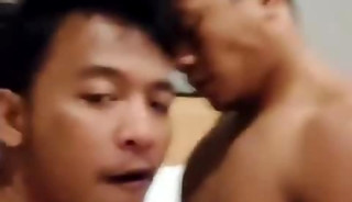 Two Asian hunky  in hotel