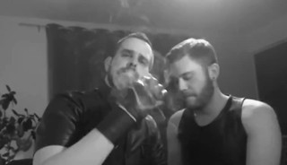 Two Muscular Guys Smoking And Kissing