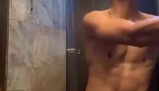Asian Boy Handsome, Beautiful body After Exercising in the Shower Gym