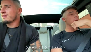 two hot handsome in car