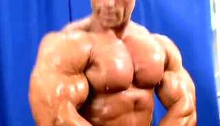 Tommy Wooster Lifting Weights And Flexing and Posing Backstage