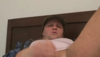 Hotel Security Guard Sits on a Bottle
