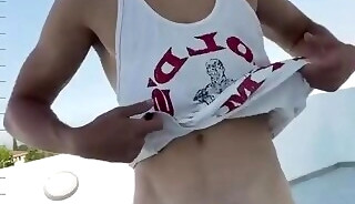 Smiling blond jerk off in the street and cum