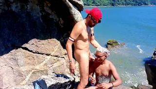 I was with my twink friend at the beach and we found a horny old man and fucked him