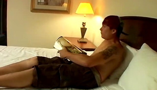 Young twink in panties dry humps while watching gay magazine