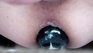Riding butt plug and jerking off